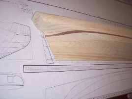 carved half-hull stern view